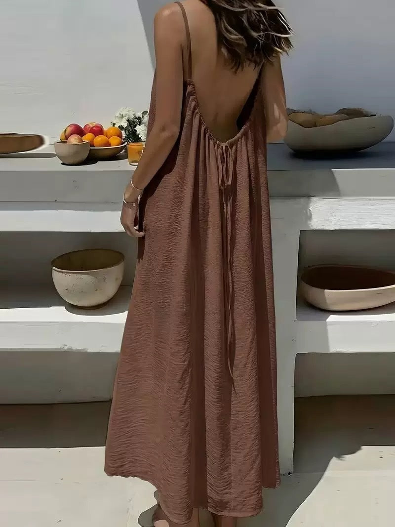 Backless halter maxi dress for beach vacations