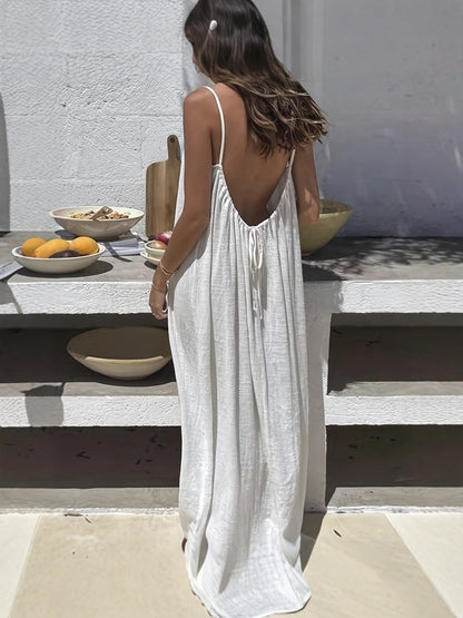Backless halter maxi dress for beach vacations